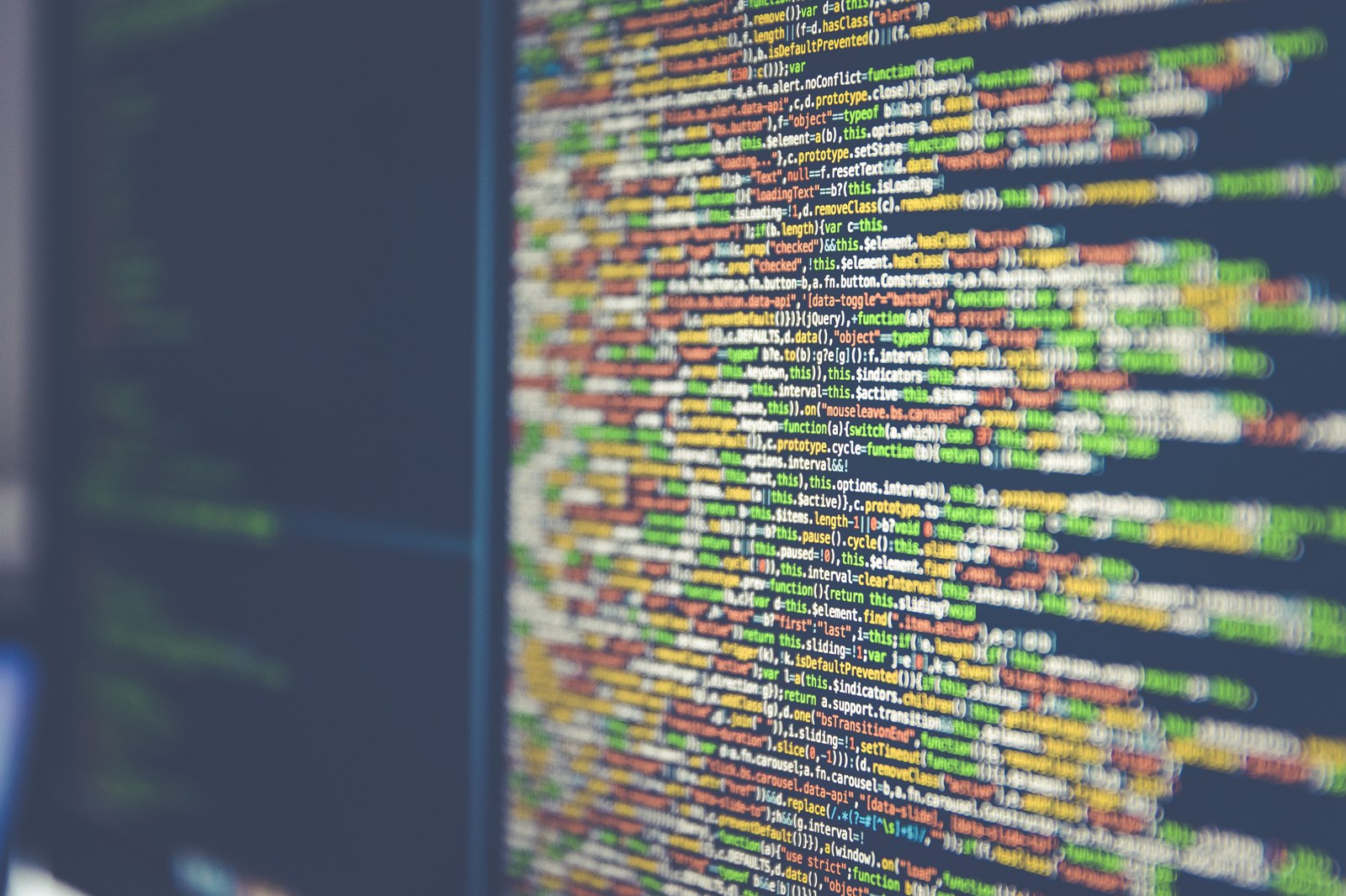 Code on computer monitor (Unsplash).jpg