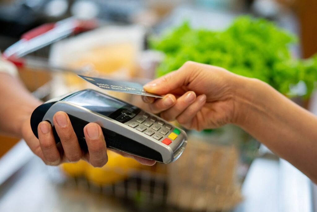 Person Using A Credit Card